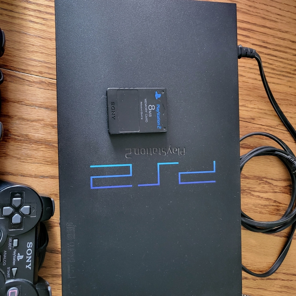 Sony PS2 with 2 controllers and 8mb memory card